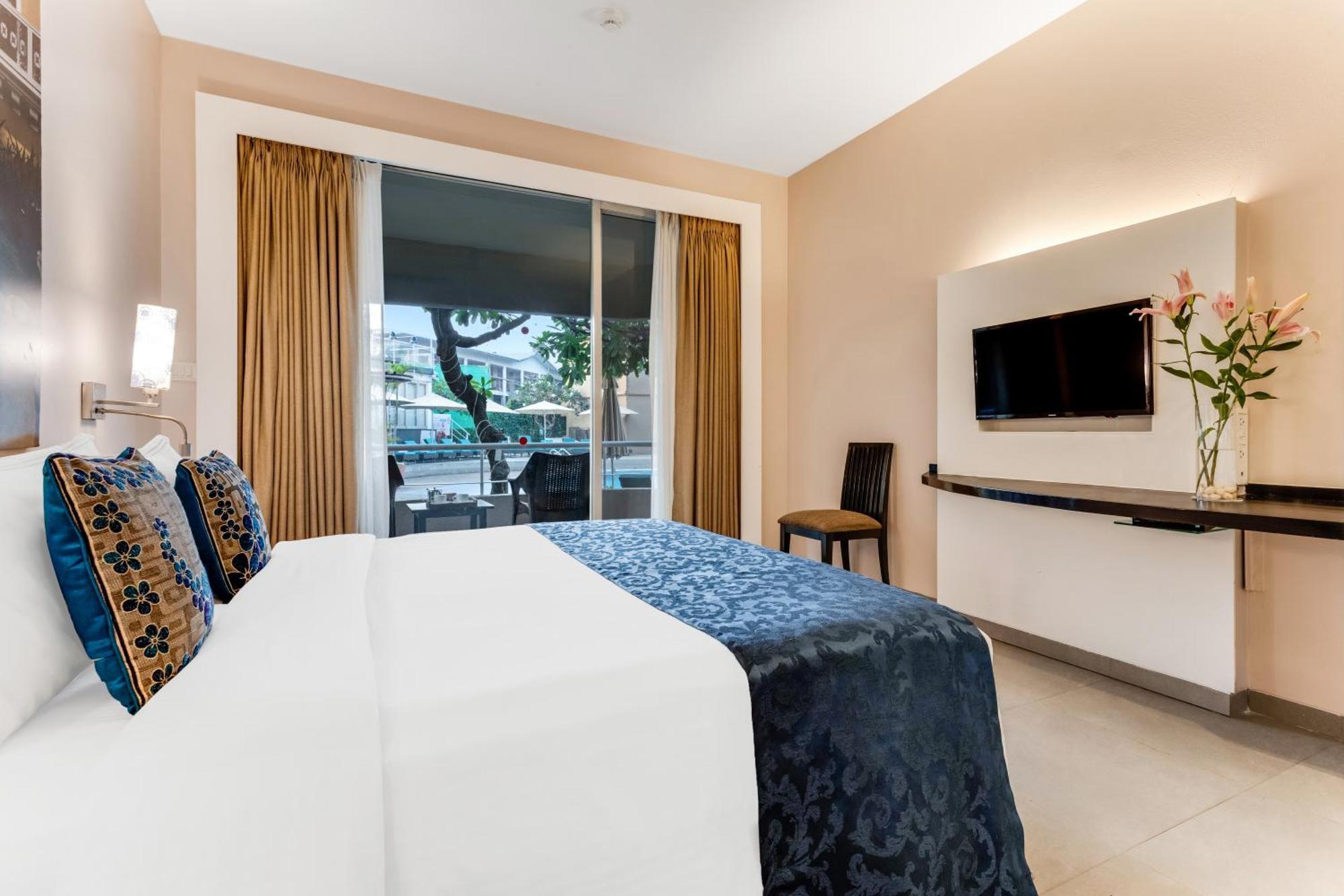 Whispering Palms Beach Resort Candolim Exteriör bild